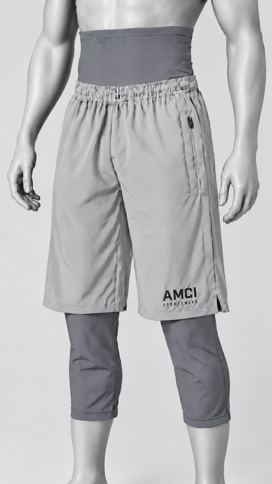 AMCI awrah shorts in grey, studio view showing the outer short and extended inner layer